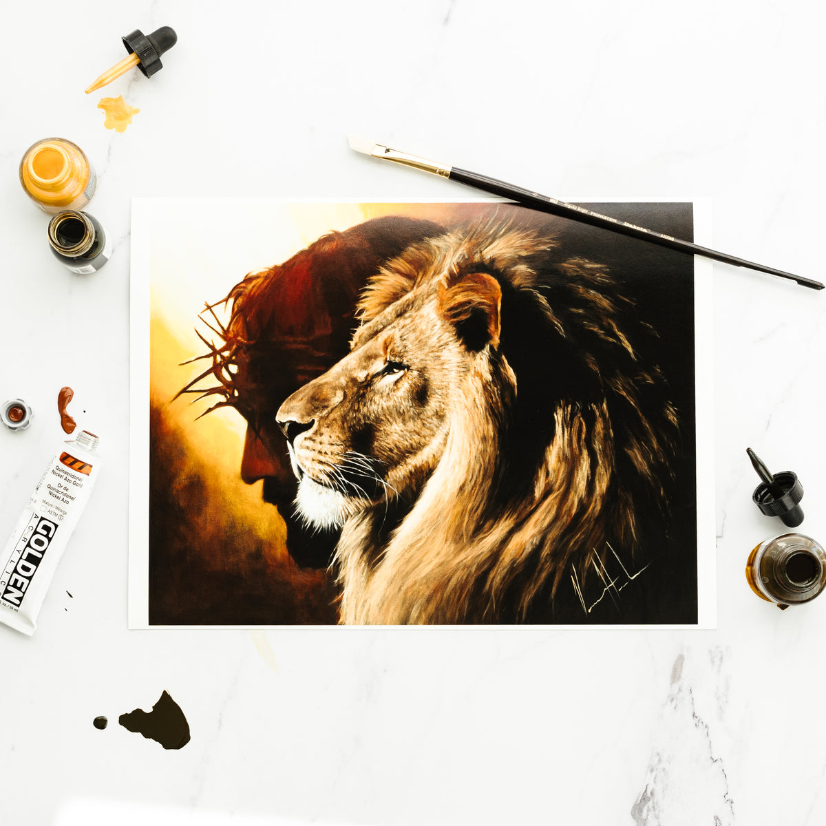 The Lion of Judah Painting with paint materials around it